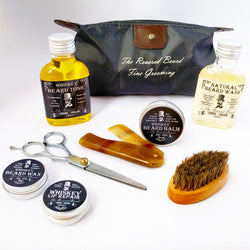 Whiskey Beard Grooming Gift Set. Whiskey scented products and accessories in a Washbag kit